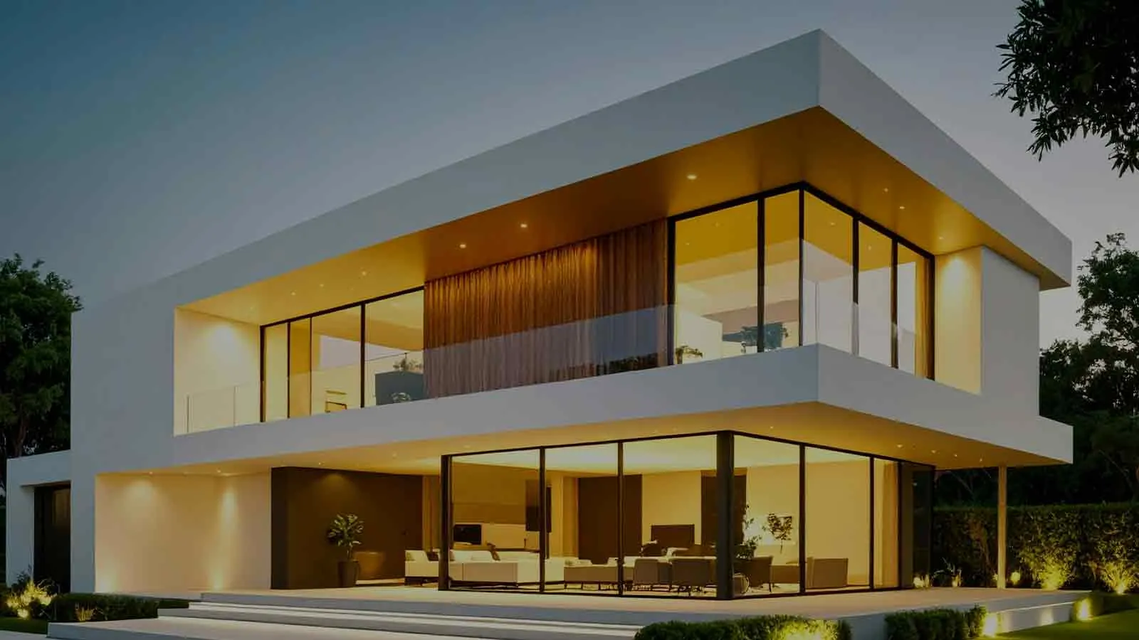 A modern two-storey glass house lit at dusk, the kind of high-value parcel where a break in the chain is worth resolving before a transaction rather than after