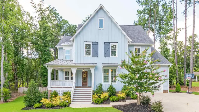 A pale blue farmhouse held in one family for decades, the kind of property whose ownership is assumed to have passed automatically on the first death